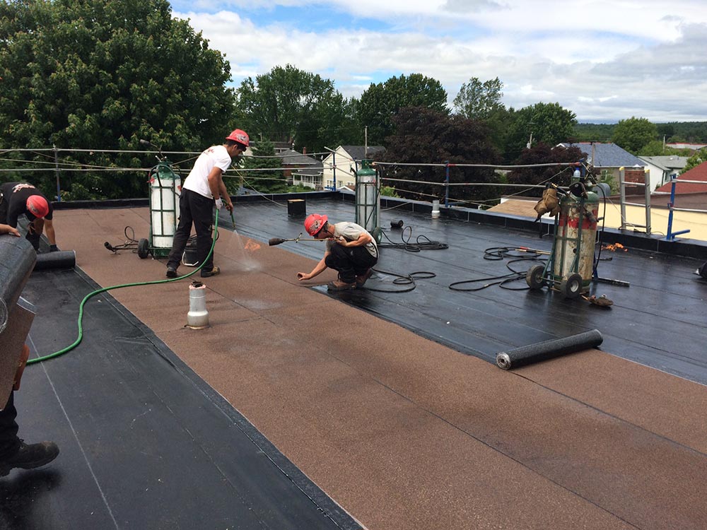 Travaux de toitures en membrane élastomère